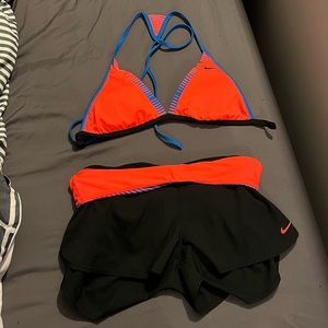 Nike swim set, shorts and reversible top. Great condition